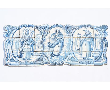 A Portuguese blue and white tile mural with the Madonna and two saints, late 18th C.98 x 42,5 cm