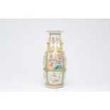 A Chinese Canton famille rose vase with palace scenes and birds and butterflies among blossoming bra