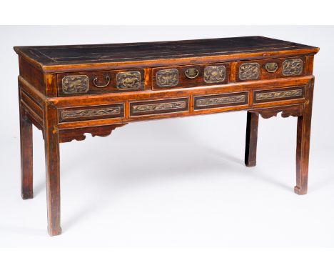 A Chinese wood wall console with partly gilt relief design, 19th/20th C.H 86 - L 152,5 - D 61,5 cm