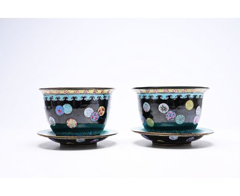 A pair of Chinese famille rose black ground jardinieres on stand with floral design, Kangxi mark, 19th C.Dia.: ca. 22,8 - 22 