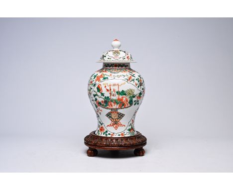 A Chinese famille verte 'flower basket' vase and cover, Kangxi mark, 19th C.H 53 - 44,5 cm (with and without base)