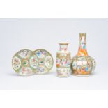 Two Chinese Canton famille rose vases and two plates, 19th C.
