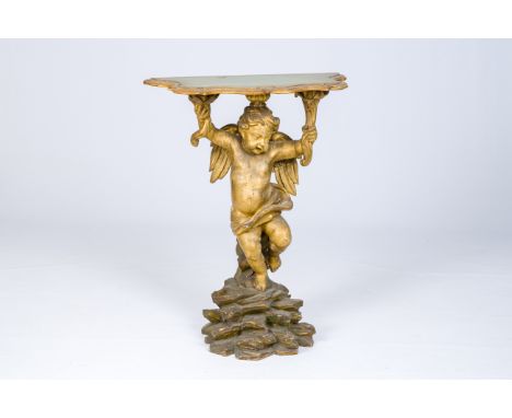 A gilt and polychrome decorated wood wall console in the shape of an angel standing on a rock, 18th C.H 89,5 - L 71,5 - D 34,