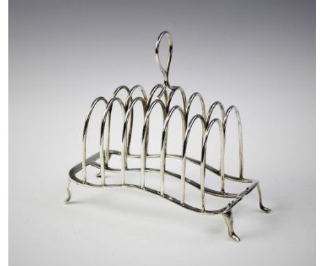 An Edwardian six division silver toast rack by William Hutton & Sons, London 1906, with loop handle on four pad feet, 16.5cm 