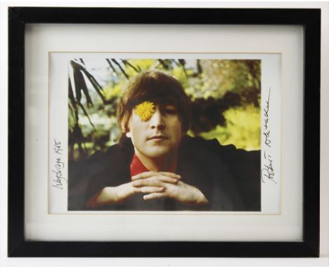 BEATLES / JOHN LENNON INTEREST:  Robert Whittaker,  Signed photographic print on paper,  Portrait of John Lennon with dandeli