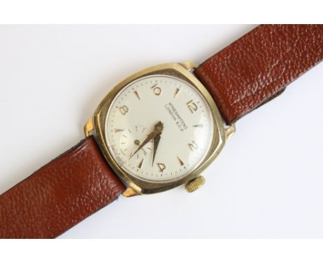 A Winegartens London E.C.2 9ct gold vintage wristwatch, the round cream dial with arabic and baton markers and subsidiary sec