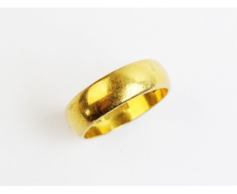 A 22ct gold wedding band, ring size L, weight 5.8gms 