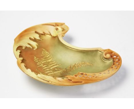 A Royal Worcester kidney shaped dish, Rd No. 160128 1475, of moulded acanthus form with gilt decorated surface depicting fern