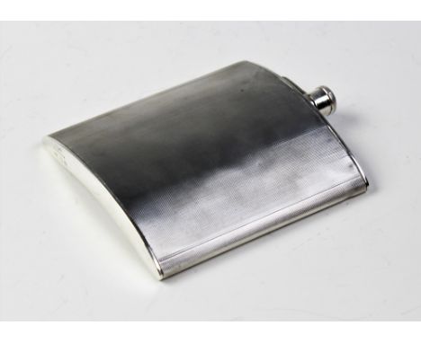 A George V silver hip flask by A Wilcox, Birmingham 1936, of curved rectangular form with engine turned decoration and bayone