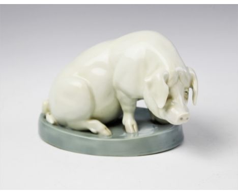 After Carl August Brasch (German, 1866-?), a ceramic model of a pig, probably early 20th century, the pale cream pig modelled
