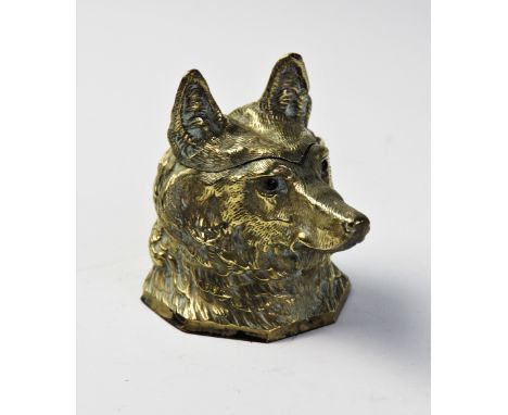 A Victorian novelty inkwell modelled as a foxes mask, with hinged cover and set with glass eyes, 11cm high For condition info