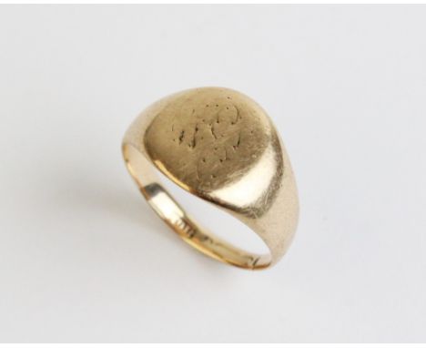 A 9ct gold signet ring, central cartouche with engraved initials (worn) with tapering shoulders and plain polished shank, rin