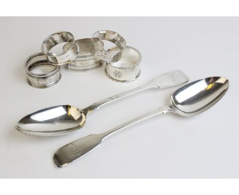 A pair of Victorian silver fiddle pattern serving spoons by William Robert Smily, London 1857, each plain polished with engra