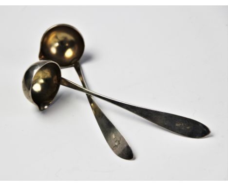 A pair of 19th century continental silver cream ladles, the handles engraved with thistles, stamped to reverse '12L' and 'BOH