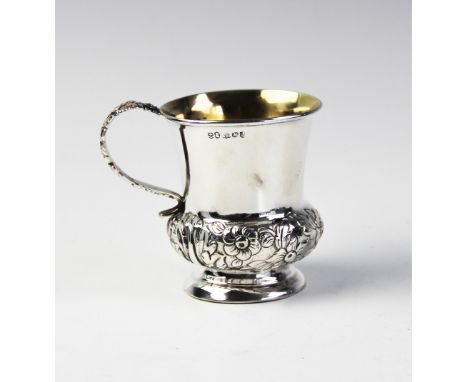 A William IV silver mug by Spooner Clowes & Co, Birmingham 1826, with flared rim and baluster body on pedestal foot, with flo