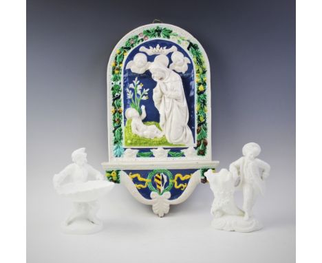 An Italian Cantagalli faience majolica wall plaque, early 20th century, the relief moulded plaque depicting the Madonna and C