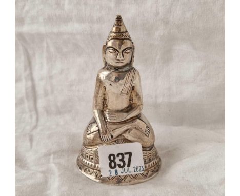 A silver encased seated Buddha, 4.5" high