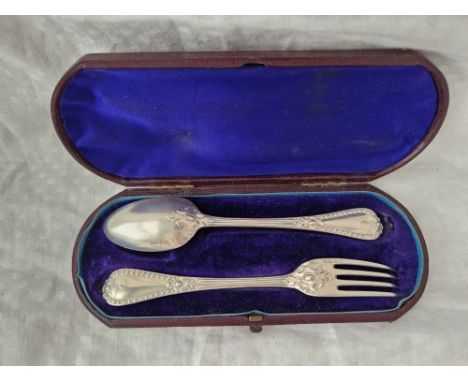 A Victorian boxed Christening set of a spoon and fork with raised decoration, London 1868 by GA, 6g
