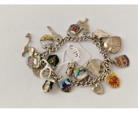 A silver charm bracelet 31 gms