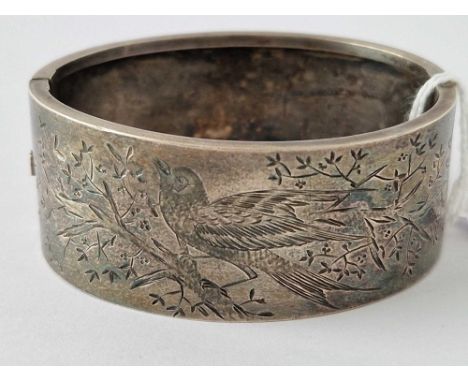A wide silver Victorian bangle 32 gms