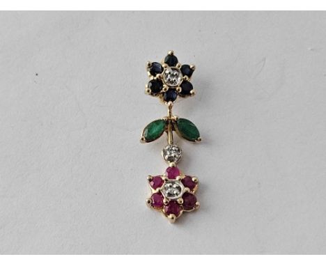 A pretty pendant in the form of three flowers ruby sapphire emeralds and diamonds