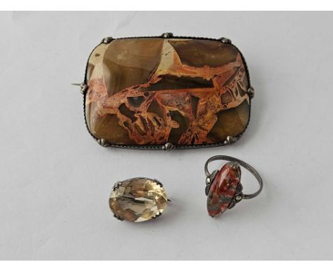 A silver mounted brooch, ring, etc