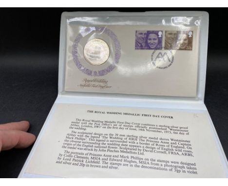 Silver medallion in case