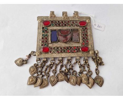 A unusual middle eastern silver stone set talisman