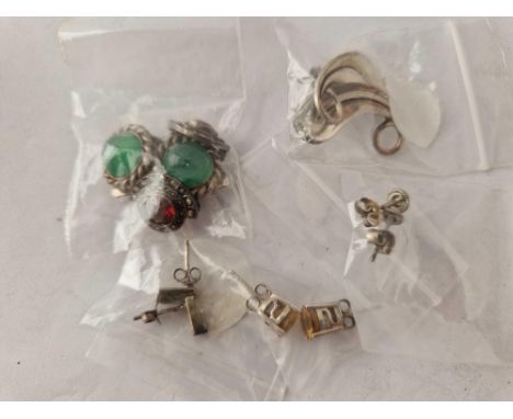 Six pairs of assorted silver earrings