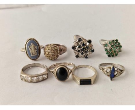 Eight assorted silver rings