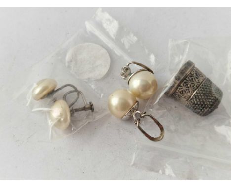 Two pair of silver pearl earrings and a silver thimble