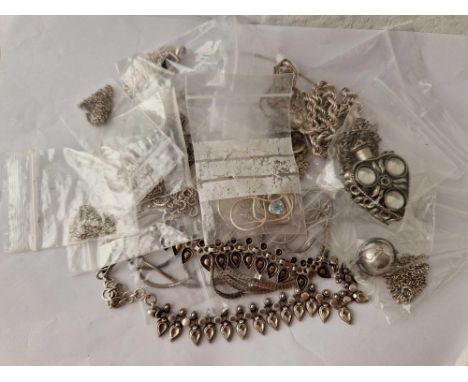 Twenty two assorted silver necklaces