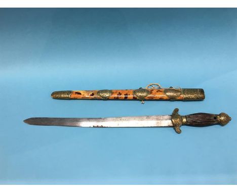 A Chinese short sword with tortoiseshell scabbard, engraved brass mounts, wood grip, length of blade 41cm