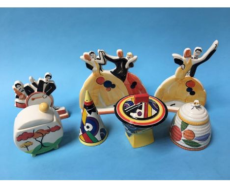 Seven pieces of Clarice Cliff style pottery