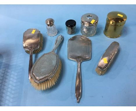 A silver hand mirror brush, a quantity of coins etc.