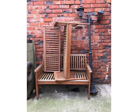 Two garden benches and a lamp