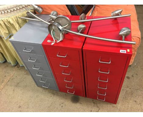Three filing drawers, mirror, fold out single bed etc.