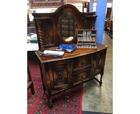 An oak mirror back barley twist sideboard