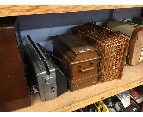 A shelf of radiograms, sewing machine etc.