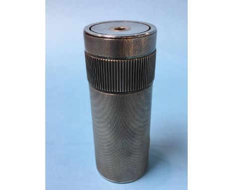 A Dupont of Paris engine turned cylindrical table lighter