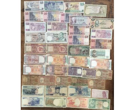 Large World Banknote collection of approximately 64, in a collectors folder.