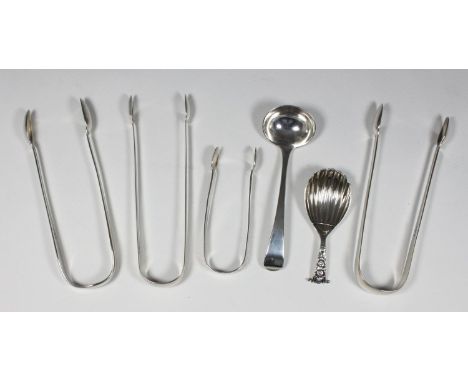 A late Edwardian silver caddy spoon by Wakely &amp; Wheeler with shell bowl, hallmarked London, 1910, four pairs of Georgian 