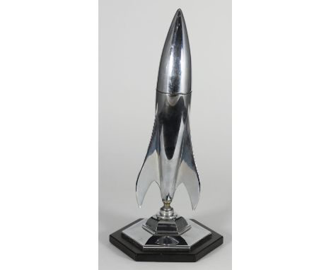 A novelty 'Planet' chromium-plated rocket table lighter, on ball and socket stand and octagonal plinth, 28cm high 