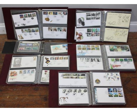 A collection of approximately 300 First Day Covers across six albums, ranging from 1982 - 2011, some Royal commemorative exam