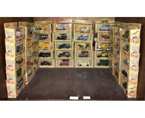 Fifty Lledo 'Days Gone' scale model cars and vans etc, all boxed and mint 