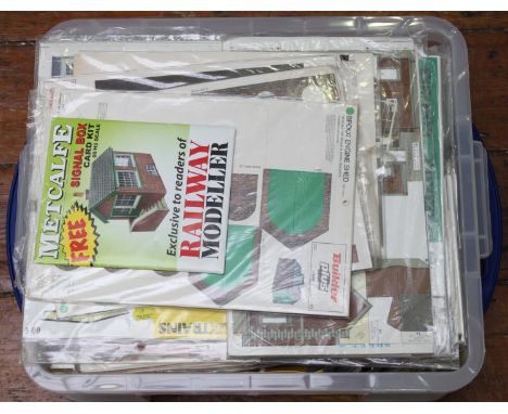 A collection of card model railway building kits including Metcalfe and Superquick examples, signal boxes, engine sheds etc. 