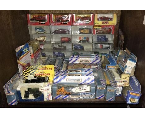 SECTION 34. A collection of 41 assorted boxed and loose die-cast model vehicles comprising examples by Burago, Matchbox and L