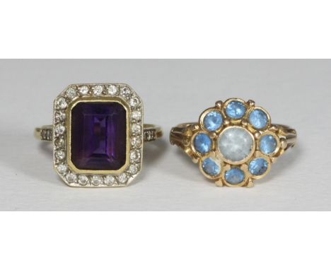 Two various 18ct gold rings, one set with 9 light blue coloured stones, the other with an octagon cut amethyst coloured stone