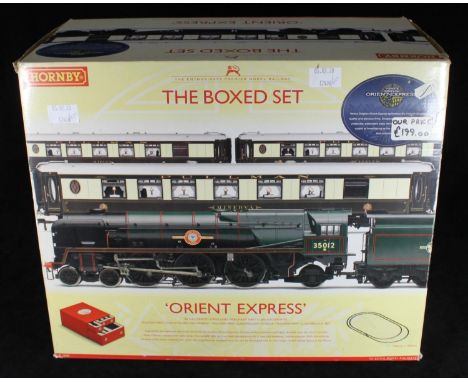 A Hornby R1038 'Orient Express' the boxed set containing 'United States Lines' Merchant Navy class engine and tender, 3 light
