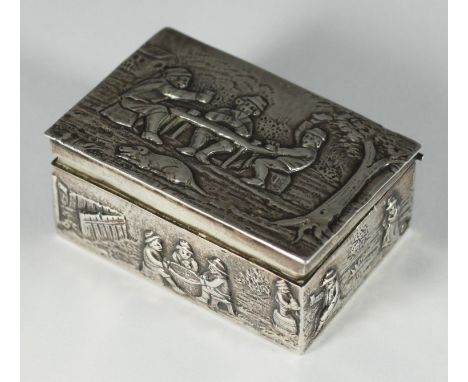 A continental silver snuff box, probably Dutch, of rectangular form, the top with an embossed scene depicting men drinking an